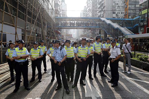 人民日报：香港少数人非法侵犯公共空间是在开民主倒车