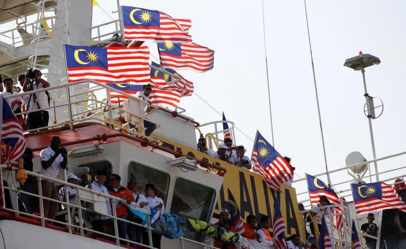 缅甸派多名政府官员接收马来西亚援罗兴亚人物资船